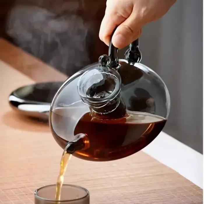 Théière en verre transparent avec infuseur élégante pour maison et bureau occasions spéciales thé aux feuilles mobiles service à thé pratique et durable