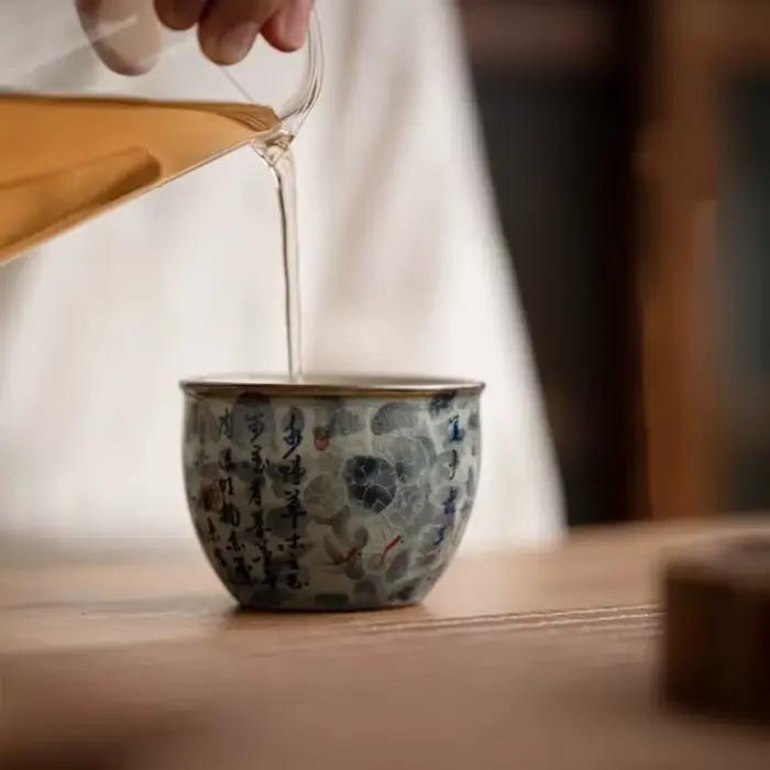 Tasse à thé chinoise en porcelaine bleue et blanche