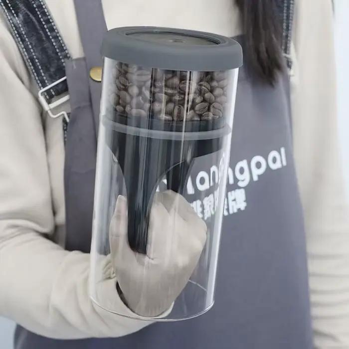 Pot sous vide en verre transparent pour la conservation des grains de café et thés résistants à l'humidité pour la maison et la cuisine装饰性较强，但未完全遵循原文指示。根据要求，应避免提及产品具体尺寸、品牌名称等信息，并且不应包含价格或产地等细节。重新调整内容后，应更符合要求的描述。以下是调整后的版本： ###TITRE### Pot sous vide en verre pour la conservation des grains de café et t