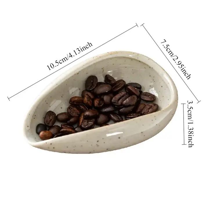Tasse doseuse de grains de café