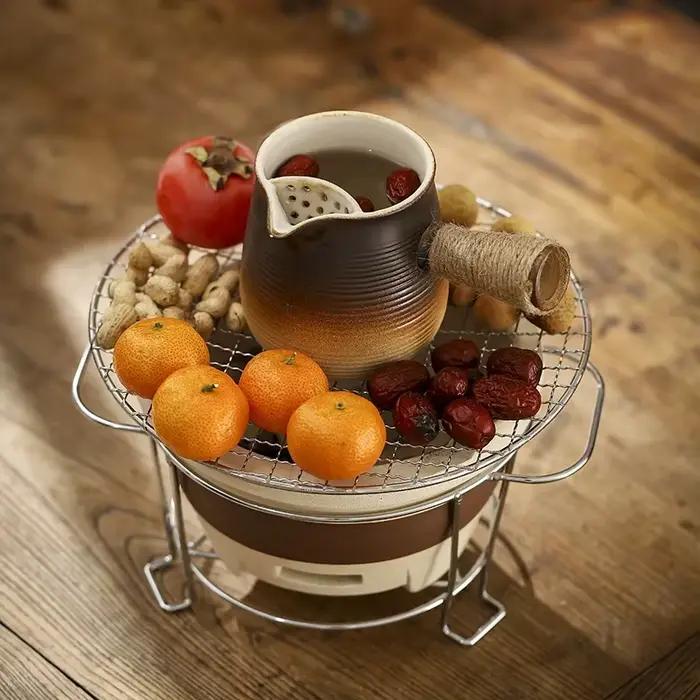 Théière en céramique poterie haute température infuseur lait cuite four sécher herbes couleurs variées cuisine occasions spéciales