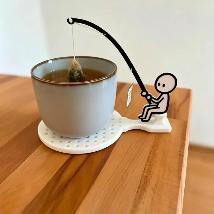 Support à sachets de thé en forme de pêcheur multi-couleurs pour tasse ludique et pratique pour cuisine et bureau